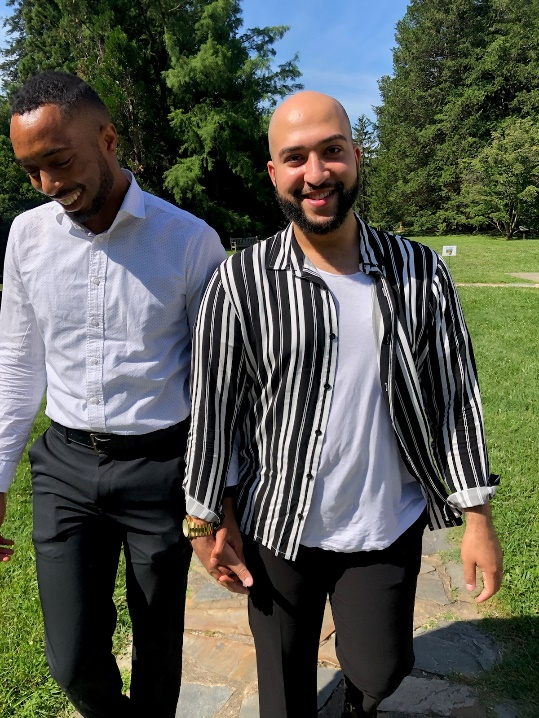 Dale & Joseph holding hands in the park